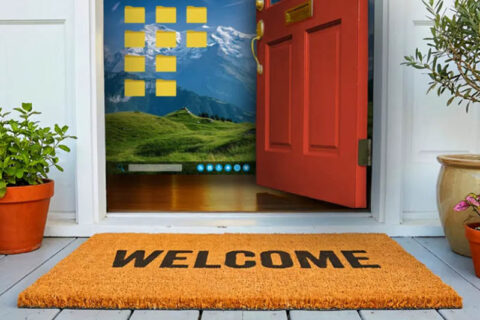 A welcome mat at a house entrance